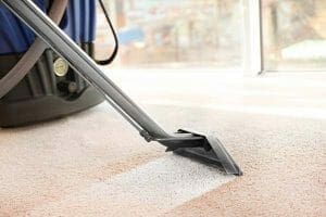 Using carpet extractor machine