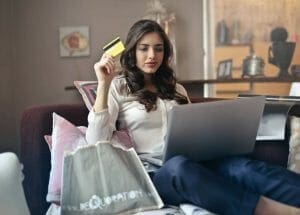 Woman shopping online from home